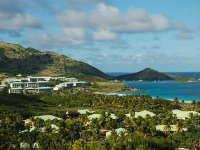 Owners photos of Mt Vernon. We were in the pink building in the middle of the front row. Very quick access to the pool or beach.  Pinel Island  is the little island off to the right.